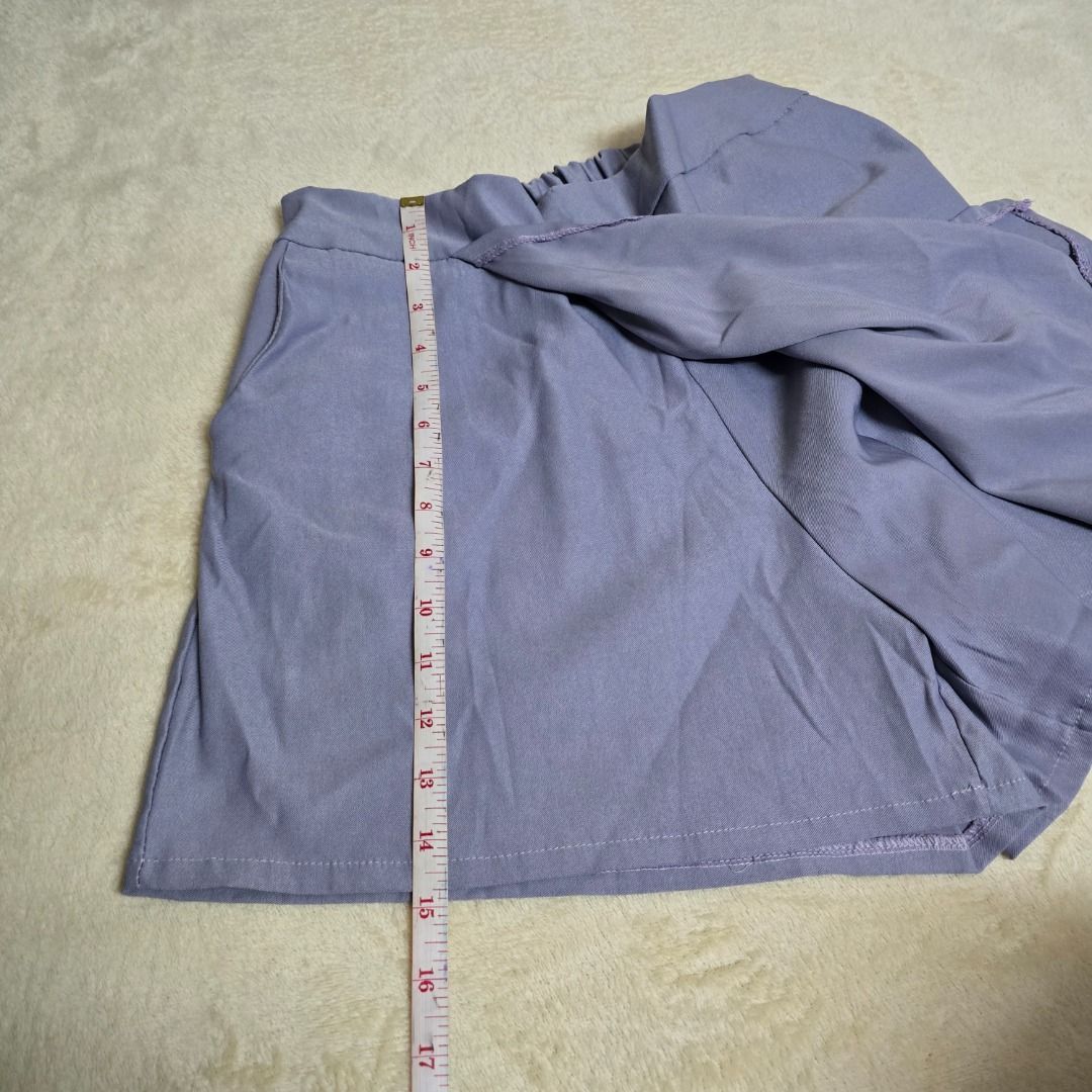 Lavender Elastic Waist Shorts/Pants/Skort (Category: Shorts) located in Pasay City. Submitted by fruityorange (Listing ID 1458380970, Image 2). Description: Color: Lavender / Light Purple Size: Adjustable waistband (Max stretch: 22 inches, see photo) Material: Soft, breathable fabric Design: Elastic waistband, hemmed edges, lightweight feel Highlights - Clear waistband measurement photo (22-inch max stretch) - Multiple angles showing fabric textu