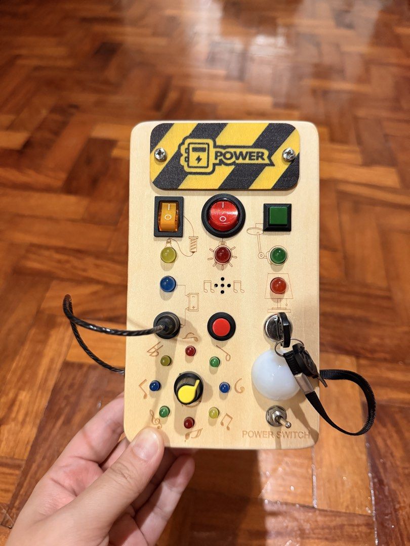 LED Switch Busy Board for Kids - Power Switch Toy (Category: Educational & Learning Toys) located in Quezon City. Submitted by eimaj08 (Listing ID 1458356099, Image 1). Description: - Fun busy board for little ones - Features buttons, switches, and a turning key - Lights up and makes sounds for engaging play - Excellent for developing fine motor skills - Keeps children entertained for hours - Includes original packaging - Guaranteed hours of fun!