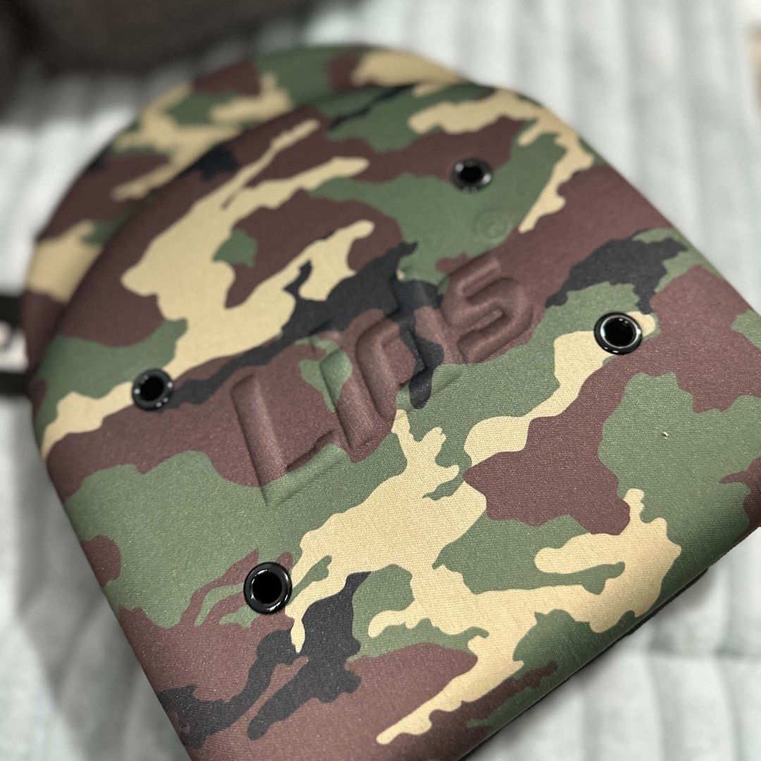 Lids Camo Cap Carrier Case (Category: Caps & Hats) located in Agdangan. Submitted by kiiiiingg (Listing ID 1458329763, Image 2). Description: - Protect your caps with this Lids camo cap carrier. - Holds multiple hats. - Zipper closure for secure storage. - Made of durable material. - Ideal for travel or home storage. - Keeps your caps in their original shape..