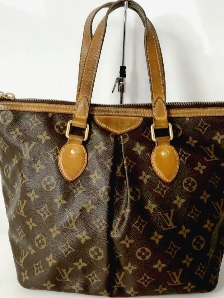 Louis Vuitton Monogram Canvas Tote Bag (Category: Luxury Bags & Wallets) located in Manila. Submitted by lene48 (Listing ID 1458422511, Image 1). Description: - Classic Louis Vuitton monogram tote - Durable leather trim - Secure zipper closure - Interior pockets for organization - Comes with a stylish scarf tied to the handle - Ideal for everyday use - Spacious interior.