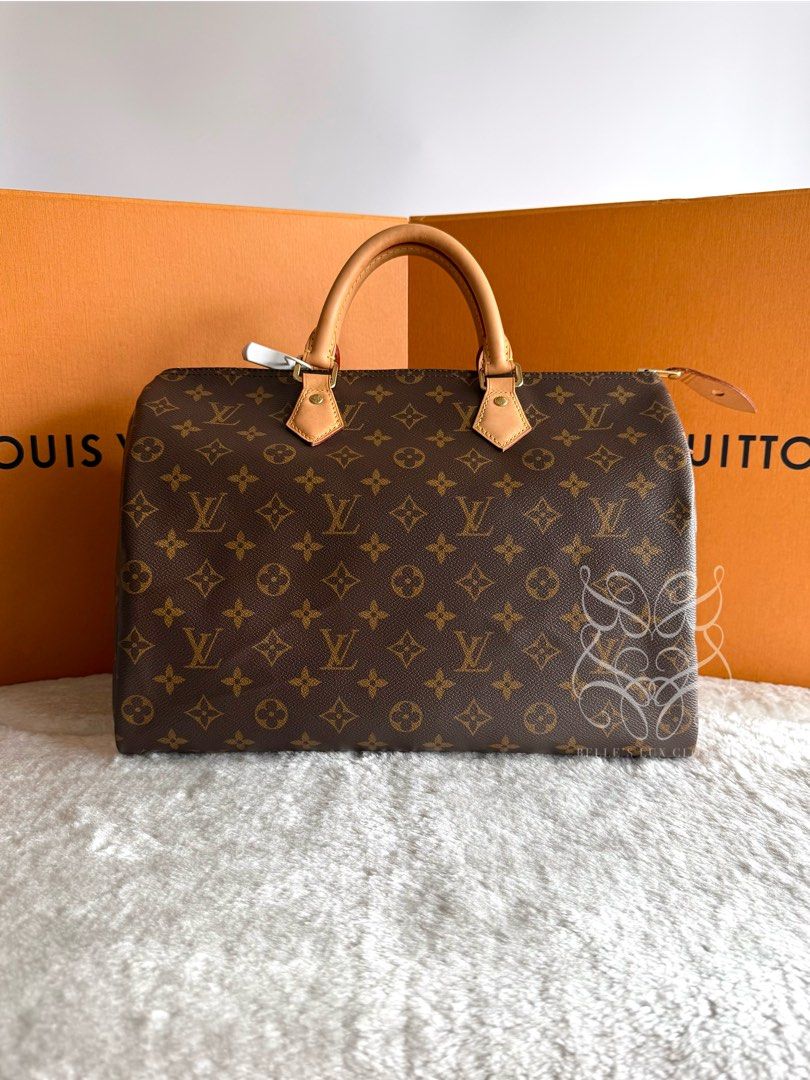 Louis Vuitton Speedy 35 in Monogram Canvas (Category: Luxury Bags & Wallets) located in Paranaque City. Submitted by belles_lux_closet (Listing ID 1458457741, Image 2). Description: AUTHENTIC SPEEDY 35 NEW MODEL IN MONOGRAM CANVAS (Microchipped) ✅ 100% Guaranteed Authentic ✅ Mint Condition, Rank A ✅ Microchipped ✅ Comes with dust bag; lock set, and bag organizer! ✅ Legit seller ✅ Retails at ~Php 120,000 in-stores, selling for only Php 69,800! ✅ K