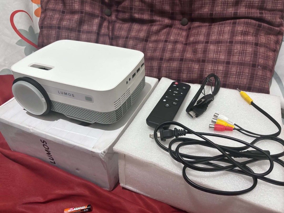 Lumos Dawn Smart Projector (Category: Projectors) located in Manila. Submitted by youngocean_c6829a (Listing ID 1458487122, Image 1). Description: The Lumos Dawn Smart Projector: It features built-in apps like Netflix and YouTube, an Android OS with 1GB RAM and 8GB ROM, 2,500 lumens brightness, and a native 600p resolution with 1080p support for screen sizes up to 150 inches. Key Features ✅ Smart OS: Built-in Android system with pre-installed app