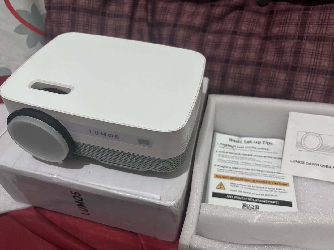 Lumos Dawn Smart Projector (Category: Projectors) located in Manila. Submitted by youngocean_c6829a (Listing ID 1458487122, Image 2). Description: The Lumos Dawn Smart Projector: It features built-in apps like Netflix and YouTube, an Android OS with 1GB RAM and 8GB ROM, 2,500 lumens brightness, and a native 600p resolution with 1080p support for screen sizes up to 150 inches. Key Features ✅ Smart OS: Built-in Android system with pre-installed app