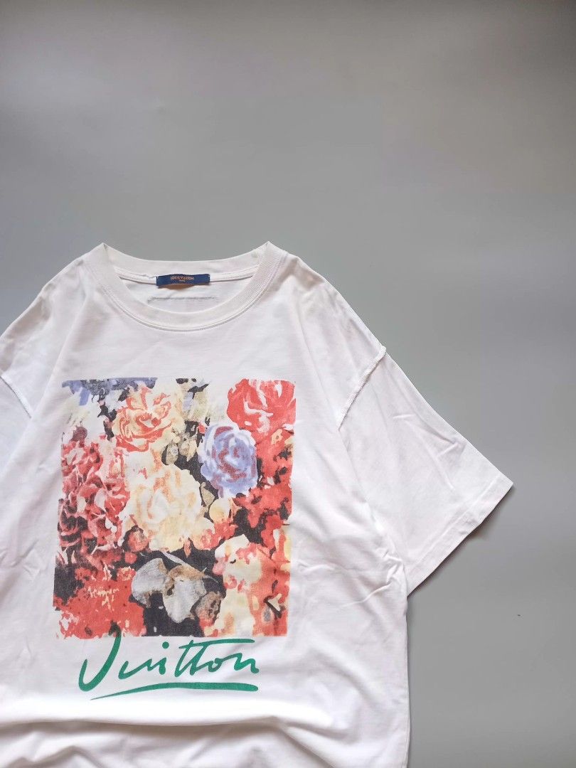 lv laser print graphic tee (Category: Tshirts & Polo Shirts ) located in San Isidro. Submitted by lagloots (Listing ID 1458384436, Image 2). Description: lv graphic tee laser print hindi kasama yung mga green sa issue na part (cam probs) fits large DIMES (IN INCHES) LENGTH: 29 / WIDTH: 22 CONDITION: 9/10 [] COLOR RATE: 9/10 ISSUE: minimal stains, small cut (not pinhole).