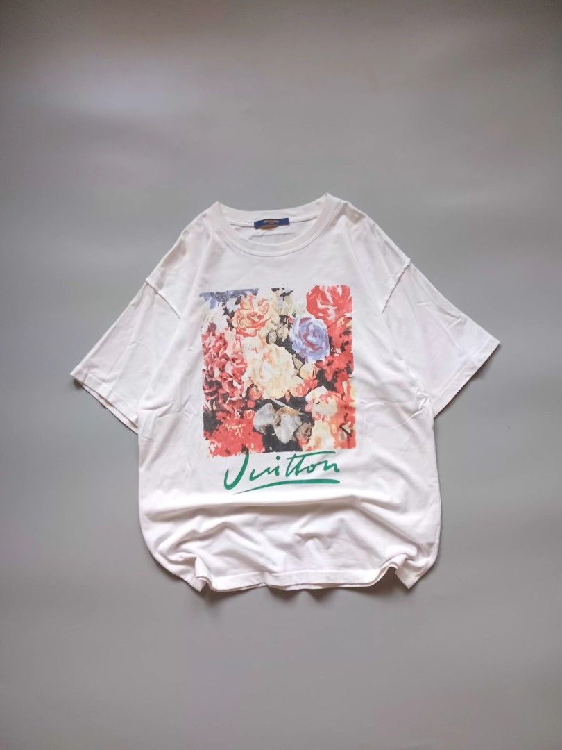 lv laser print graphic tee (Category: Tshirts & Polo Shirts ) located in San Isidro. Submitted by lagloots (Listing ID 1458384436, Image 1). Description: lv graphic tee laser print hindi kasama yung mga green sa issue na part (cam probs) fits large DIMES (IN INCHES) LENGTH: 29 / WIDTH: 22 CONDITION: 9/10 [] COLOR RATE: 9/10 ISSUE: minimal stains, small cut (not pinhole).