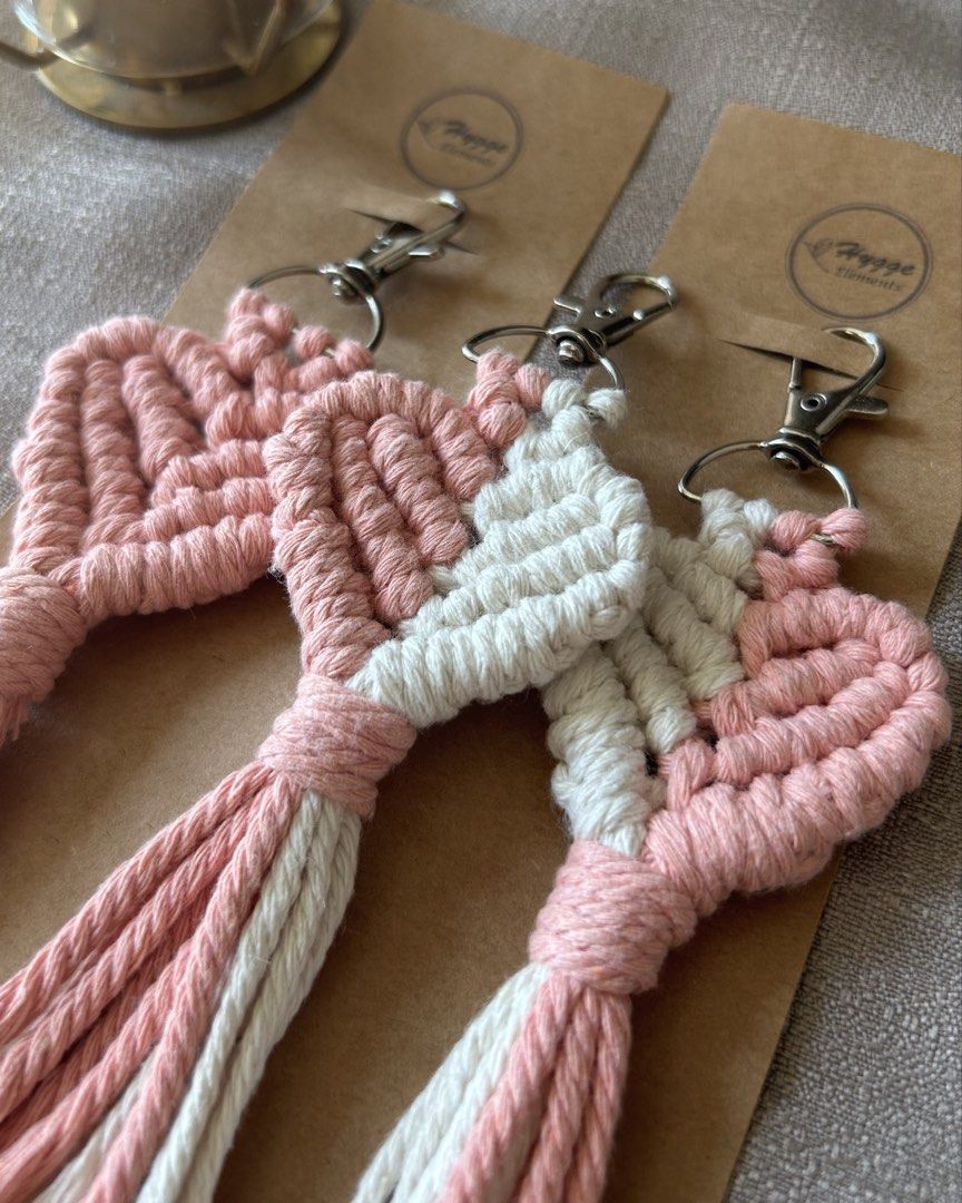 Macrame Heart Keychain (Category: Handmade Craft) located in Quezon City. Submitted by hygge.elements (Listing ID 1458489951, Image 1). Description: Useful & aesthetic everyday pieces with a handmade touch. 🤎 Available Colors : flesh, pink, light blue & cream Includes: 🤎 1 pc two-tone pastel color Heart Macrame Keychain Great for: • Work/school essentials • Everyday keys • Small gifts • Friends & coworkers.