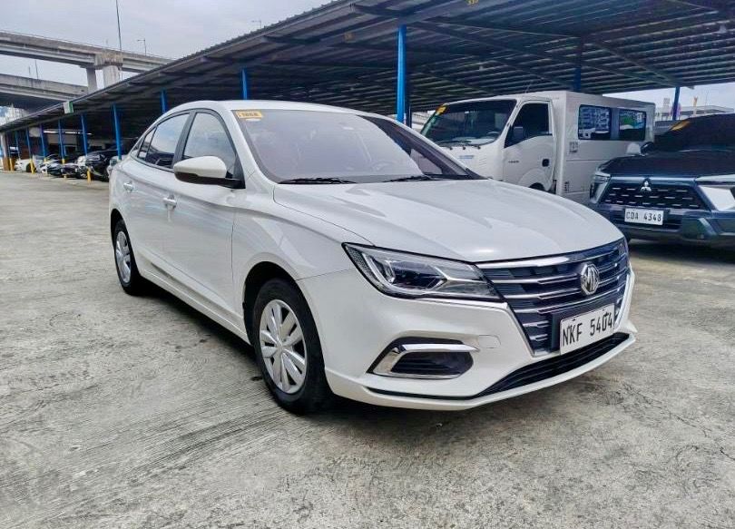 MG 5 (Category: Used Cars) located in Quezon City. Submitted by jayjet.jayjet (Listing ID 1458350796, Image 1). Description: 2024 MG 5 CORE Automatic Transmission 1st owned unit 18tkm White Gasoline All Power All Original 1st Owned Unit No Issues No Accidents Mechanic Inspected Complete Tools, Jack and Spare Tire Price P388k Financing/Trade in accepted Sample Financing Computations Down P120k all in P11k+ 4yrs P13k+ 3yrs For Bank Approval Contact