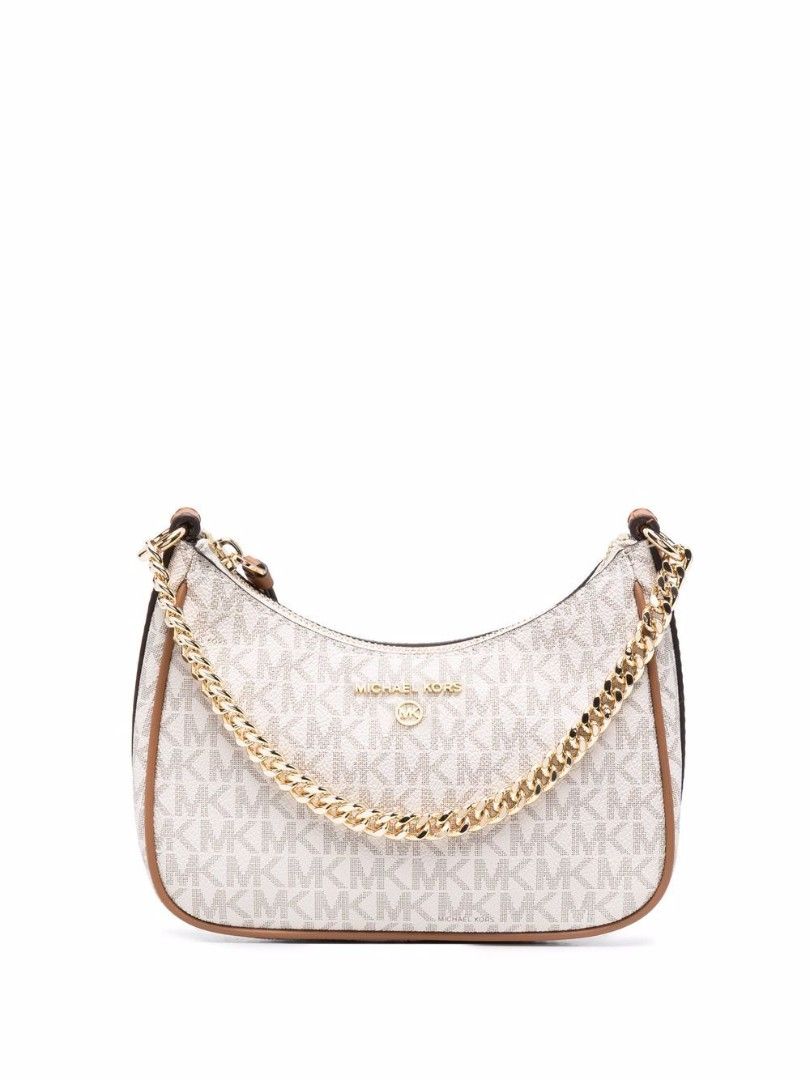Michael Kors Monogram Shoulder Bag (Category: Luxury Bags & Wallets) located in Manila. Submitted by ishifishy (Listing ID 1458369098, Image 1). Description: - Michael Kors shoulder bag - Classic MK monogram print - Elegant gold chain strap - Stylish brown trim details - Ideal for everyday wear.