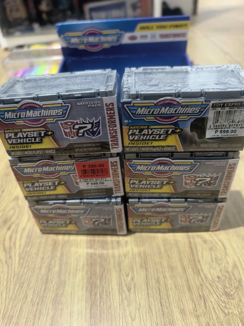 Micro Machines Transformers Mystery Pack Playset Vehicle (Category: Vehicle & Diecast Models) located in Manila. Submitted by kenslie (Listing ID 1458376986, Image 1). Description: - Micro Machines Mystery Packs for sale. - Each pack contains one playset and one vehicle. - Some packs feature Transformers themes. - Prices vary per pack. - Please check the photos for specific pack contents and pricing..