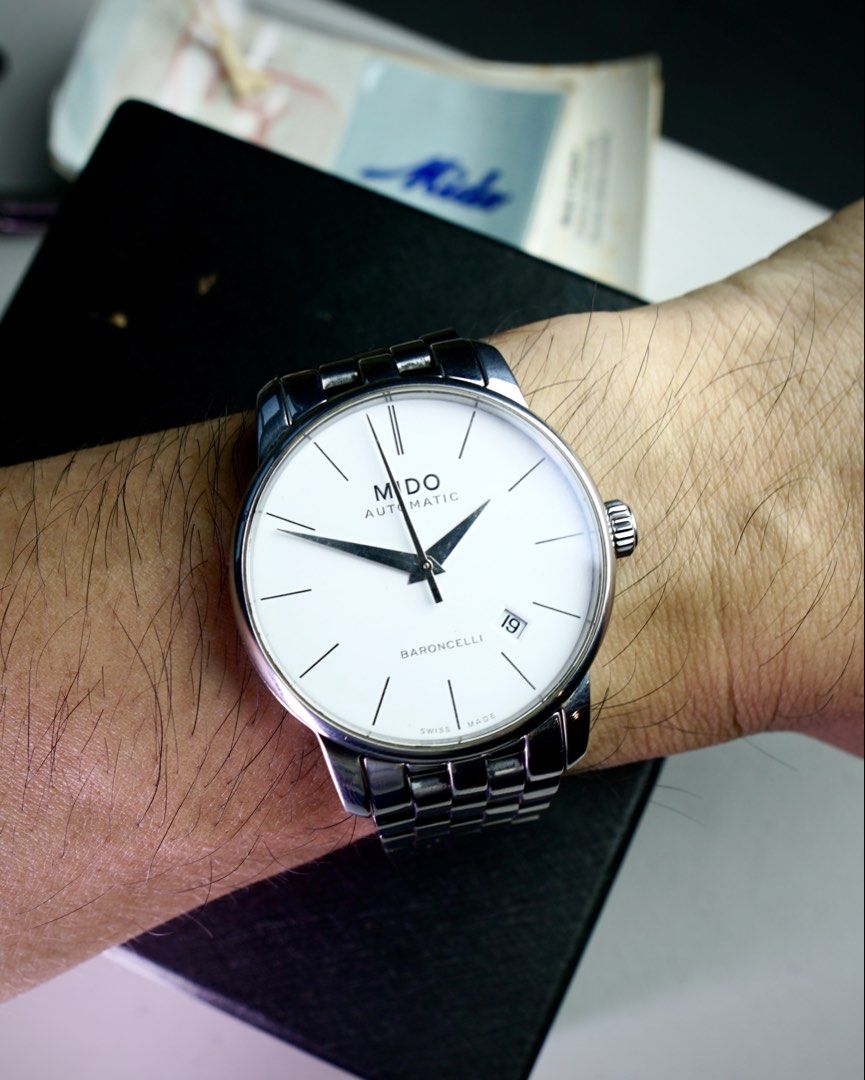 Mido Mens Automatic Watch Swiss (Category: Men's Watches) located in Mandaluyong City. Submitted by watchcraftph (Listing ID 1458381838, Image 2). Description: ❗️For Sale ❗️ [ON HAND] Mido Baroncelli Mens Automatic Watch Year: 2020 Reference: 8600.4.12.8 Genuine Pre-owned Vintage Watch Spec Sheet: ✔️38mm stainless steel case ✔️46mm lug to lug ✔️ Mido cal 41282 ETA based 2824-2 automatic movement ✔️Mido stainless steel bracelet (fits max 8.0”) ✔️S