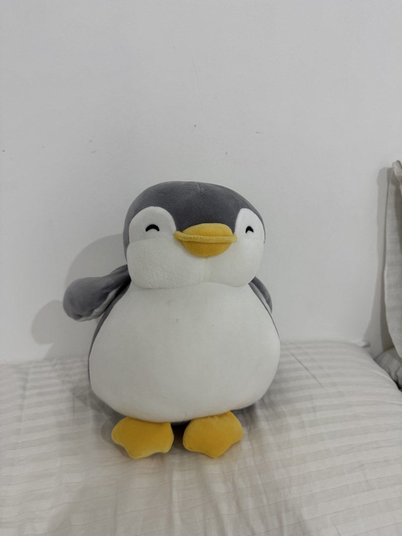 Miniso Life Penguin Plush Toy (Category: Plushies & Soft Toys) located in Quezon City. Submitted by heylouise (Listing ID 1458427921, Image 1). Description: - Adorable penguin plushie from Miniso Life - Soft grey and white body with yellow feet and beak - Ideal for cuddling or as a cute desk decoration - Perfect display size for any space - A must-have for plushie collectors!.