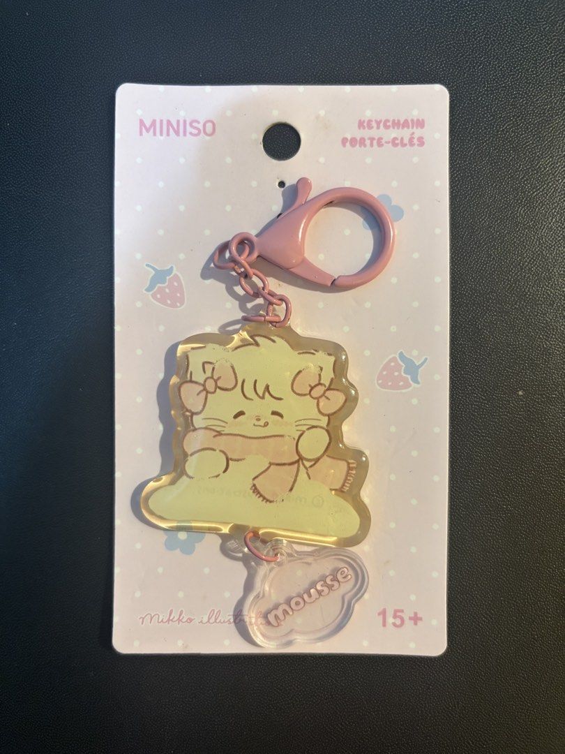 Miniso Mousse Cat Keychain (Category: Character Goods) located in Caloocan City. Submitted by poyoyoi_11 (Listing ID 1458452203, Image 1). Description: - have been used twice - yellowish - no plastic.