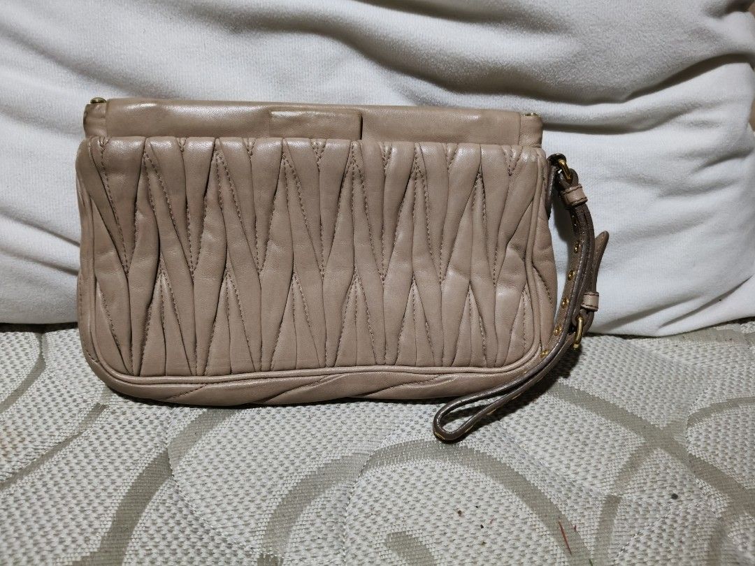 MIU MIU Wrist Wallet (Category: Luxury Bags & Wallets) located in Quezon City. Submitted by online_sari_sari (Listing ID 1458428994, Image 2). Description: 💯 authentic negotiable.