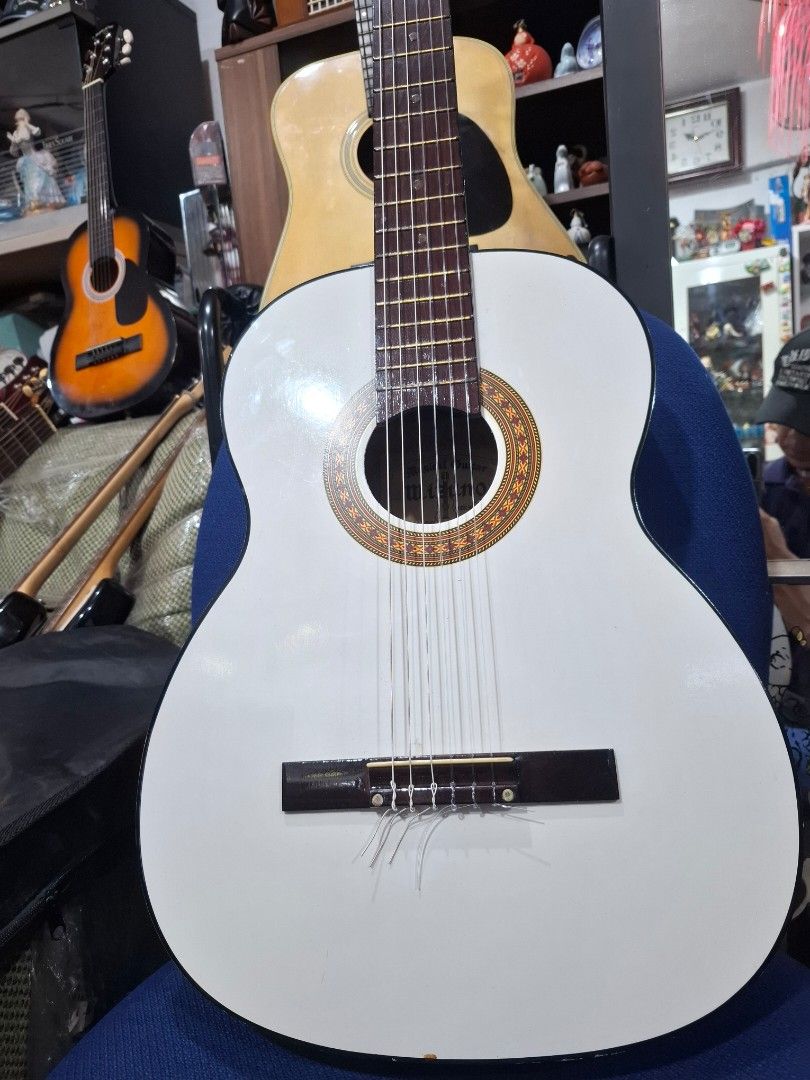 Mizuno Classical Guitar Made in Japan (Category: Musical Instruments) located in Santa Rosa. Submitted by echojapansurplus_01 (Listing ID 1458432476, Image 2). Description: - Mizuno Classical Guitar - Made in Japan - White body with natural wood neck and fretboard - Ideal for practice or beginner musicians STORE/FB PAGE: ECHO JAPAN SURPLUS .