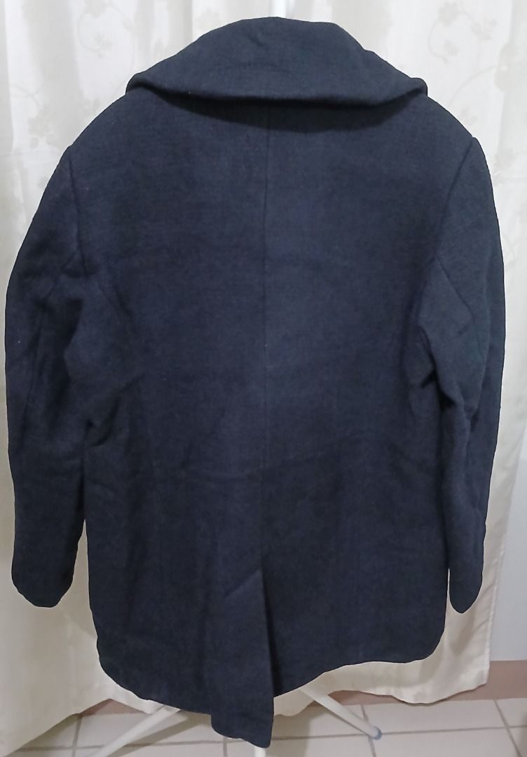 Marks and Spencer Collection Double Breasted Wool Blend Coat (Category: Coats, Jackets and Outerwear) located in Makati City. Submitted by chamarket.2022 (Listing ID 1458453361, Image 2). Description: Dark navy double-breasted coat from M&S Collection. Has unique crest-embossed buttons. Great for cooler weather. * Material - wool blend * Measurements are in the uploaded pictures NOTE: Buttons color have already faded.