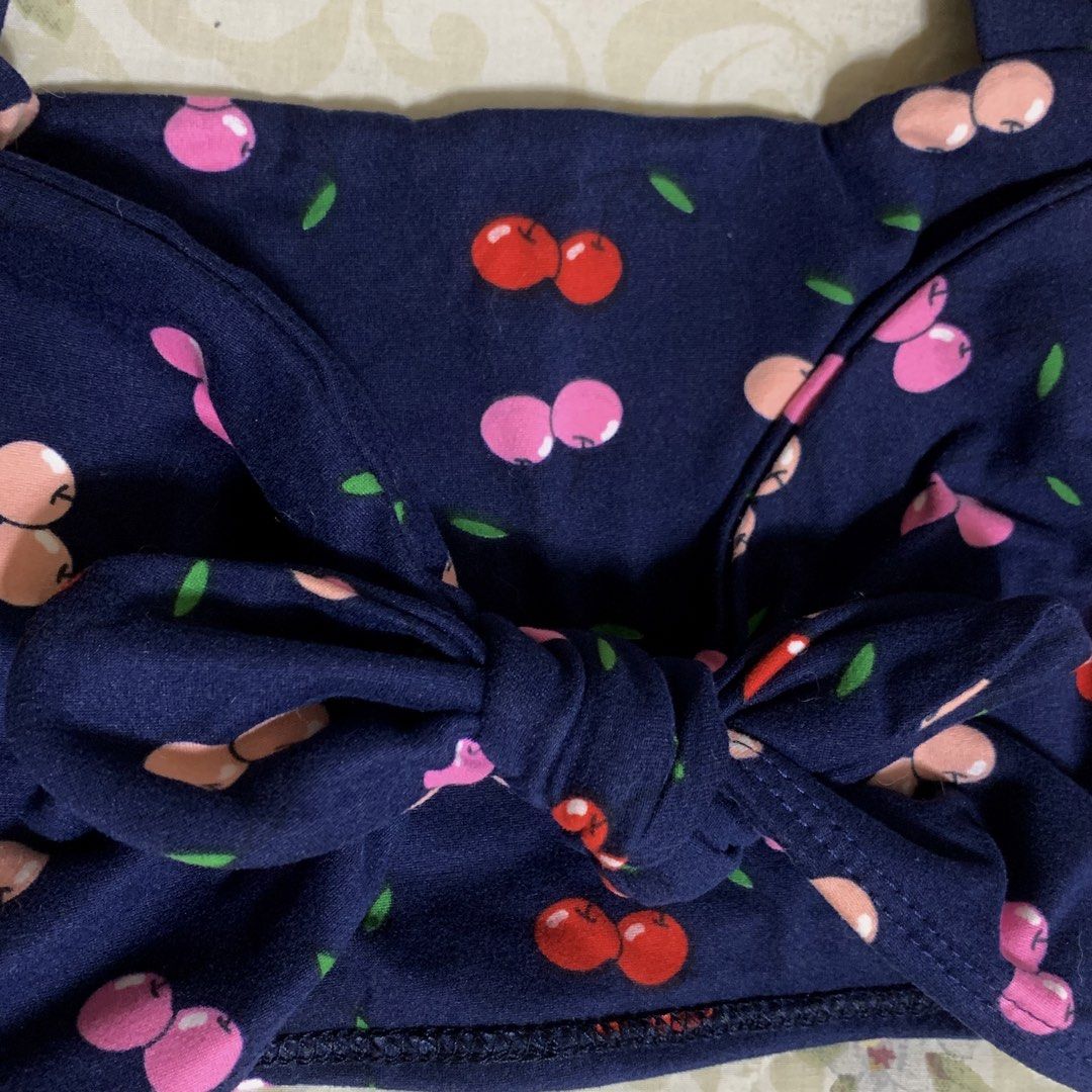 Navy Blue Cherry Print Knot Front Crop Top (Category: Others Tops) located in Manila. Submitted by maggy.bear (Listing ID 1458399454, Image 2). Description: Navy blue cherry tie top 🍒 rfs: decluttering - Self tie/adjustable - xxs to small - used once - can provide more photos - Dm if interested 🧾Gcash or vybe/bpi 📍San Juan/Mandaluyong City 📦 Jnt or lalamove.