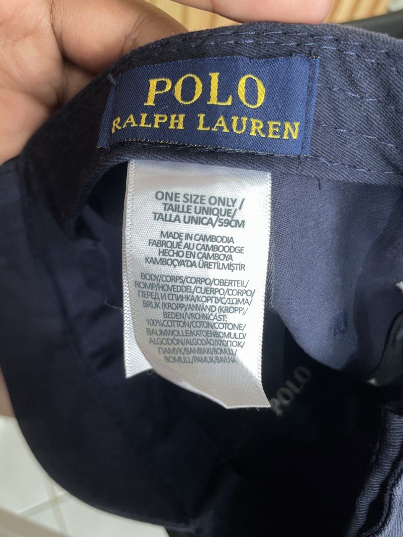 Navy Polo Ralph Lauren Cap (Category: Caps & Hats) located in Manila. Submitted by kyleee_ld (Listing ID 1458391360, Image 3). Description: - Classic navy blue cap from Polo Ralph Lauren. - Features iconic embroidered polo player logo on the front. - 'POLO' embroidered on the back. - Adjustable strap for a comfortable fit. - One size fits most. - Made in Cambodia..