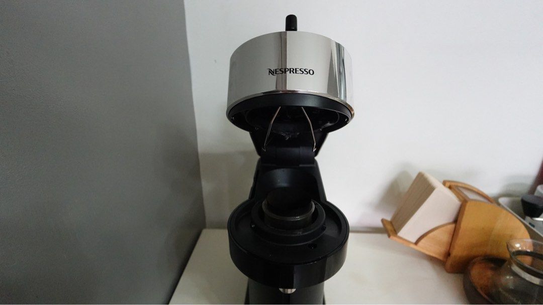 Nespresso Vertuo Next Deluxe Coffee Machine (Category: Coffee Machines & Makers) located in Pasay City. Submitted by shintiorari (Listing ID 1458494540, Image 2). Description: - Nespresso Vertuo Next Deluxe coffee machine -Bought this for around 17,000-18,000 on sale in stores. Mag-isa nalang siya that time. - Limited Edition, black and silver colorway -This is one of the rare nespresso models with stainless steel holder of capsule inside. Others