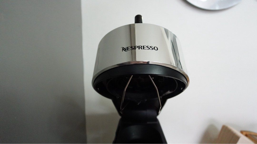 Nespresso Vertuo Next Deluxe Coffee Machine (Category: Coffee Machines & Makers) located in Pasay City. Submitted by shintiorari (Listing ID 1458494540, Image 3). Description: - Nespresso Vertuo Next Deluxe coffee machine -Bought this for around 17,000-18,000 on sale in stores. Mag-isa nalang siya that time. - Limited Edition, black and silver colorway -This is one of the rare nespresso models with stainless steel holder of capsule inside. Others
