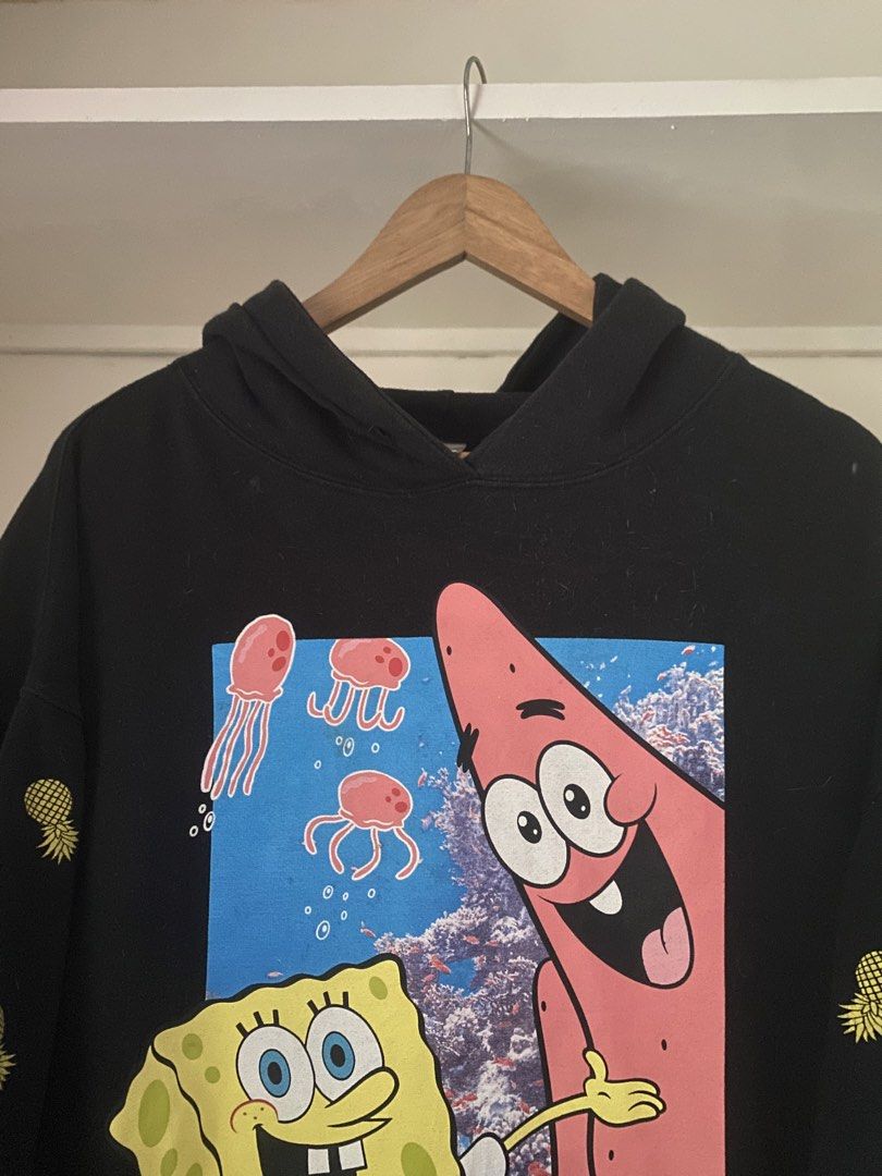 Nickelodeon Spongebob & Patrick Black Hoodie XL (Category: Coats, Jackets and Outerwear) located in Manila. Submitted by paulineogaya (Listing ID 1458389468, Image 2). Description: - Black hoodie - Features Spongebob and Patrick graphic on the front - Pineapple print on the sleeves - Size XL W: 25.5 L: 24 No issues Size large for men This is oversize for women .