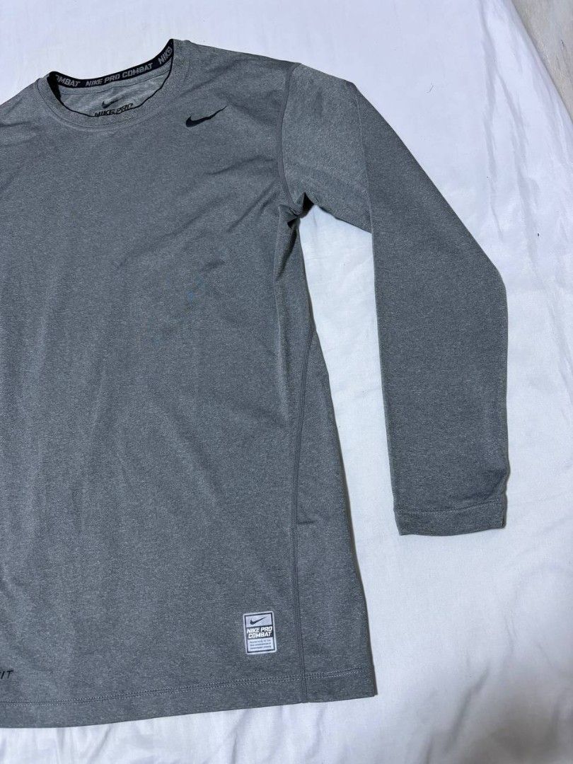 Nike Compression Pro Combat Dri-FIT Grey Long Sleeve Shirt (Category: Activewear) located in Pasig City. Submitted by heneralsupremo1892 (Listing ID 1458455540, Image 2). Description: - Grey Nike Pro Combat long sleeve shirt - Dri-FIT material to keep you dry - Ideal for workouts or as a base layer - Authentic and Legit❗ - Very Good Condition/ Almost New 🔥 - Size: L to XL 🫶 - No issue/Color may vary due to lighting🙂 THANK YOU, GOD BLESS 🙏😊.