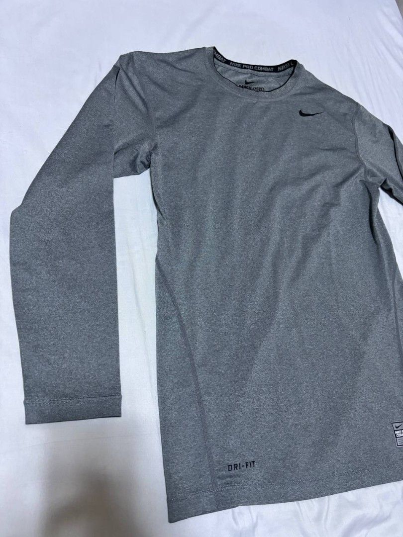 Nike Compression Pro Combat Dri-FIT Grey Long Sleeve Shirt (Category: Activewear) located in Pasig City. Submitted by heneralsupremo1892 (Listing ID 1458455540, Image 3). Description: - Grey Nike Pro Combat long sleeve shirt - Dri-FIT material to keep you dry - Ideal for workouts or as a base layer - Authentic and Legit❗ - Very Good Condition/ Almost New 🔥 - Size: L to XL 🫶 - No issue/Color may vary due to lighting🙂 THANK YOU, GOD BLESS 🙏😊.