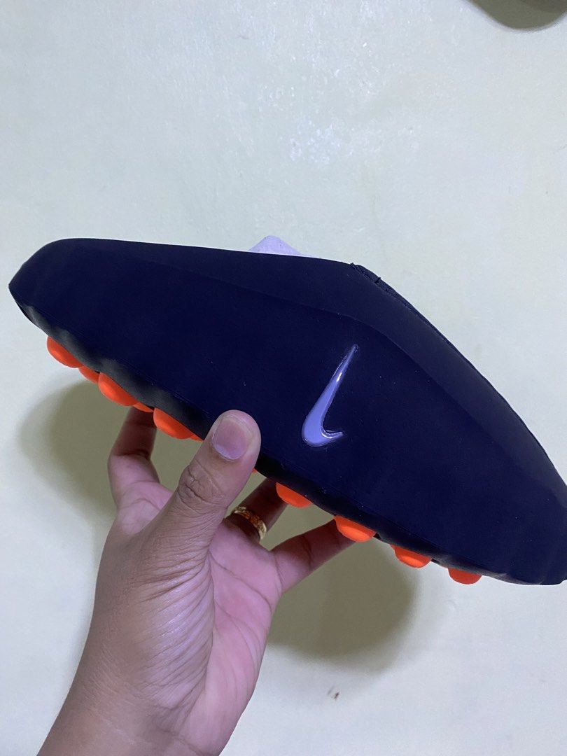 Nike Mind 001 Black Slip-On Sandals (Category: Slippers & Slides) located in Manila. Submitted by mcclaire214625 (Listing ID 1458457382, Image 3). Description: - Black Nike Mind 001 sandals - Easy slip-on style - Perforated top for enhanced breathability - Features distinctive orange sole details - Comes with original tag - Ideal for everyday casual wear.