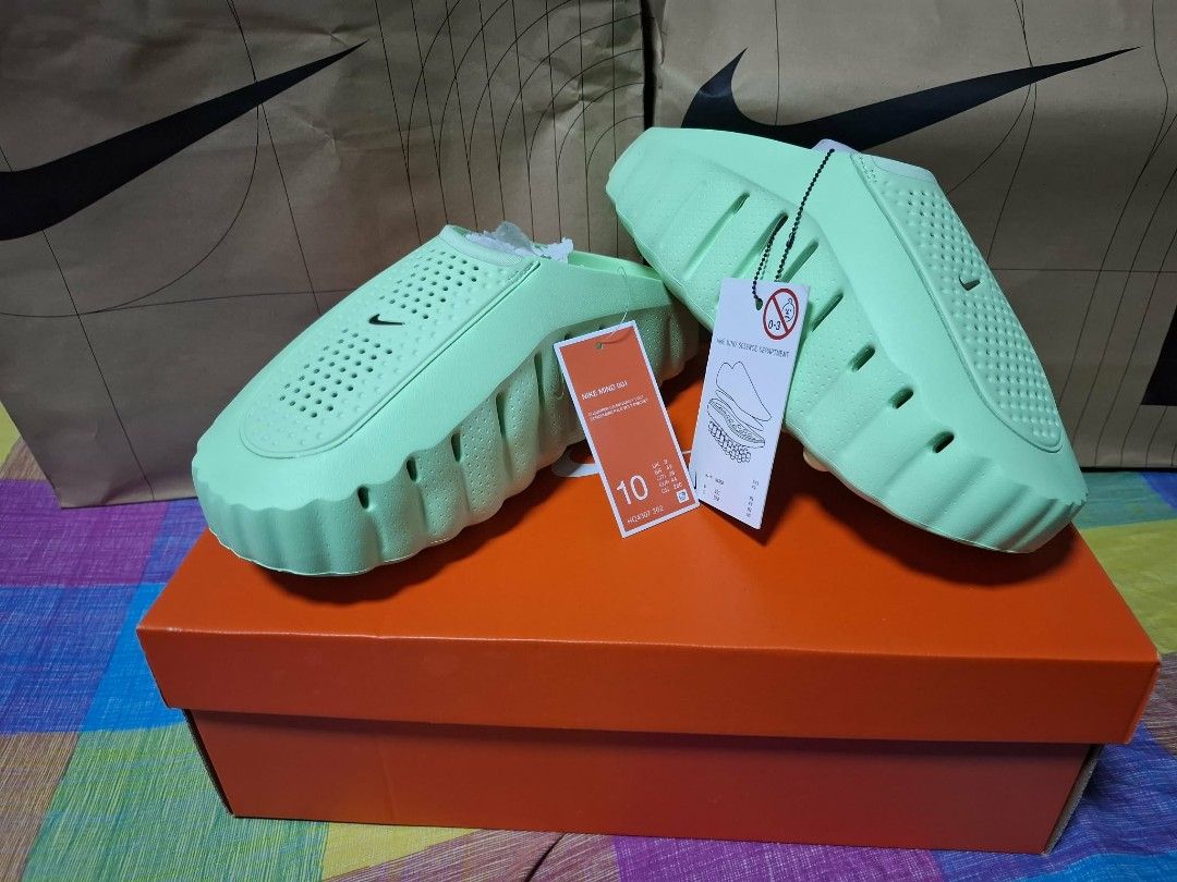 Nike Mind 001 Cucumber Calm Slides (Category: Slippers & Slides) located in Manila. Submitted by janellacer08838 (Listing ID 1458344410, Image 1). Description: - Nike Mind 001 Slides - Color: Cucumber Calm/Barely Volt - Size: 10 US - Made in Vietnam - Comfortable and easy to slip on - Ideal for casual wear or after sports - Comes with original box and tags.