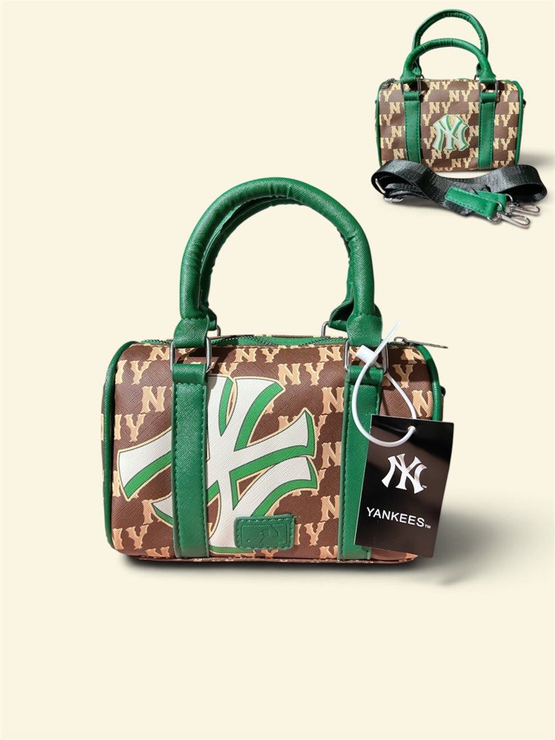NY Yankees Boston Red Sox Mini Barrel Bag (Category: Luxury Bags & Wallets) located in Cavite. Submitted by tumble24 (Listing ID 1458433046, Image 2). Description: - Cute mini barrel bag - Features NY Yankees logo and pattern - Boston Red Sox version also available - Comes with a detachable guitar strap - Ideal for carrying essentials - Perfect for any fan!.