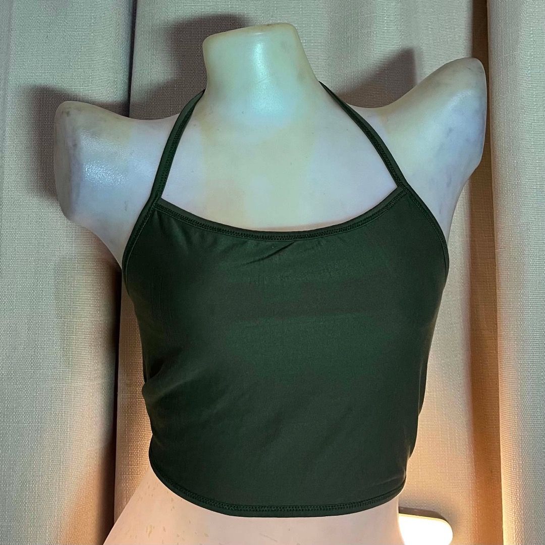 Olive Green Halter Crop Top (Category: Sleeveless) located in Malabon City. Submitted by lunapie (Listing ID 1458477853, Image 1). Description: - Basic olive green halter crop top - Stretchy material for a comfortable fit - Perfect for layering or wearing solo - Simple and versatile design - Ideal for casual outings or workouts.