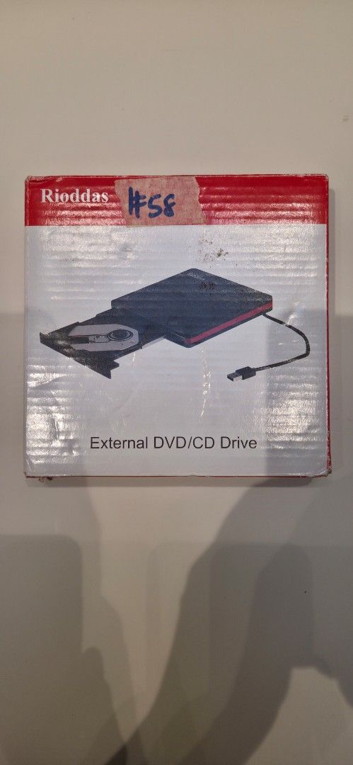 Optical Drive Reader (Category: CDs & DVDs) located in Singapore. Submitted by ldwnich (Listing ID 1458396597, Image 1). Description: - Rioddas External DVD/CD Drive - Compatible with DVDs and CDs - Easy to connect and use - Ideal for laptops or computers without optical drives - Good working condition.