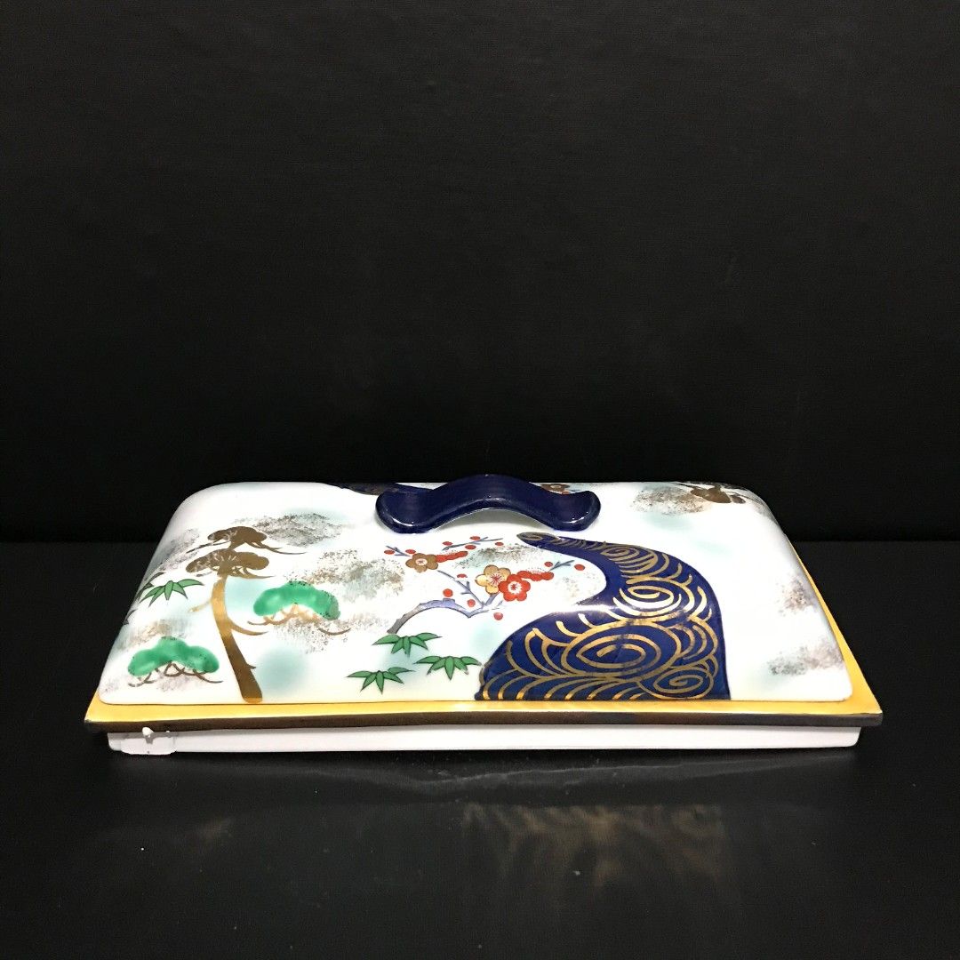 ORIENTAL RECTANGULAR SERVER WITH LID (Category: Dinnerware & Cutlery) located in Baao. Submitted by all.things.japan (Listing ID 1458324321, Image 2). Description: Oriental Serving Tray with Lid VGC, but with a little flaw on one corner Heavy 5.25 x 2.5 x 11.75 Mine: P599.00 Add Sf MOP: GCash/Maya MOD: Flash Express.