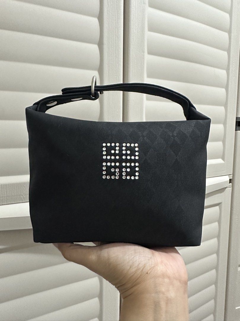 Original Givenchy mini hand bag (Category: Luxury Bags & Wallets) located in Naga. Submitted by bag.net (Listing ID 1458466493, Image 2). Description: Guaranteed original 💯 Givenchy mini handbag -Moneyback guaranteed if proven fake -Sourced from Japan -light weight -minimalist -with adjustable snap closure -stunning in actual🥰.