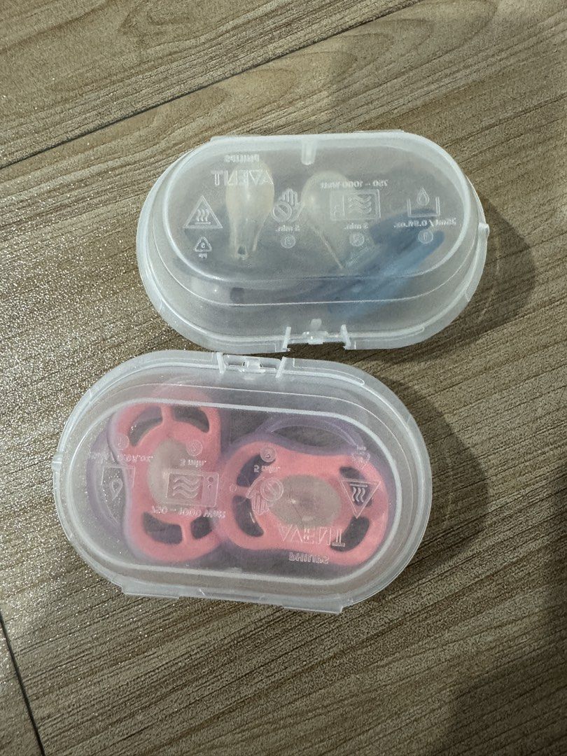 Philips Avent Pacifiers with Cases (2 sets) (Category: Soothers & Pacifiers) located in Quezon City. Submitted by heylouise (Listing ID 1458429139, Image 2). Description: - Two sets of Philips Avent pacifiers included. - One set is blue and clear. - The other set features pink and white with star patterns. - Each set comes with its own clear carrying case. - Ideal for on-the-go use. - Helps keep pacifiers clean and hygienic..