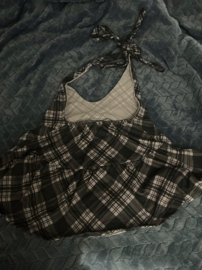 Plaid Halter Top with Tie Neck (Category: Sleeveless) located in Taytay. Submitted by eliela (Listing ID 1458388330, Image 2). Description: - Adorable plaid halter top - Adjustable neck ties for a perfect fit - Lightweight and flowy fabric - Versatile: great for casual outings or dressing up - Pairs well with jeans or shorts - A fun and stylish wardrobe addition - Never worn.