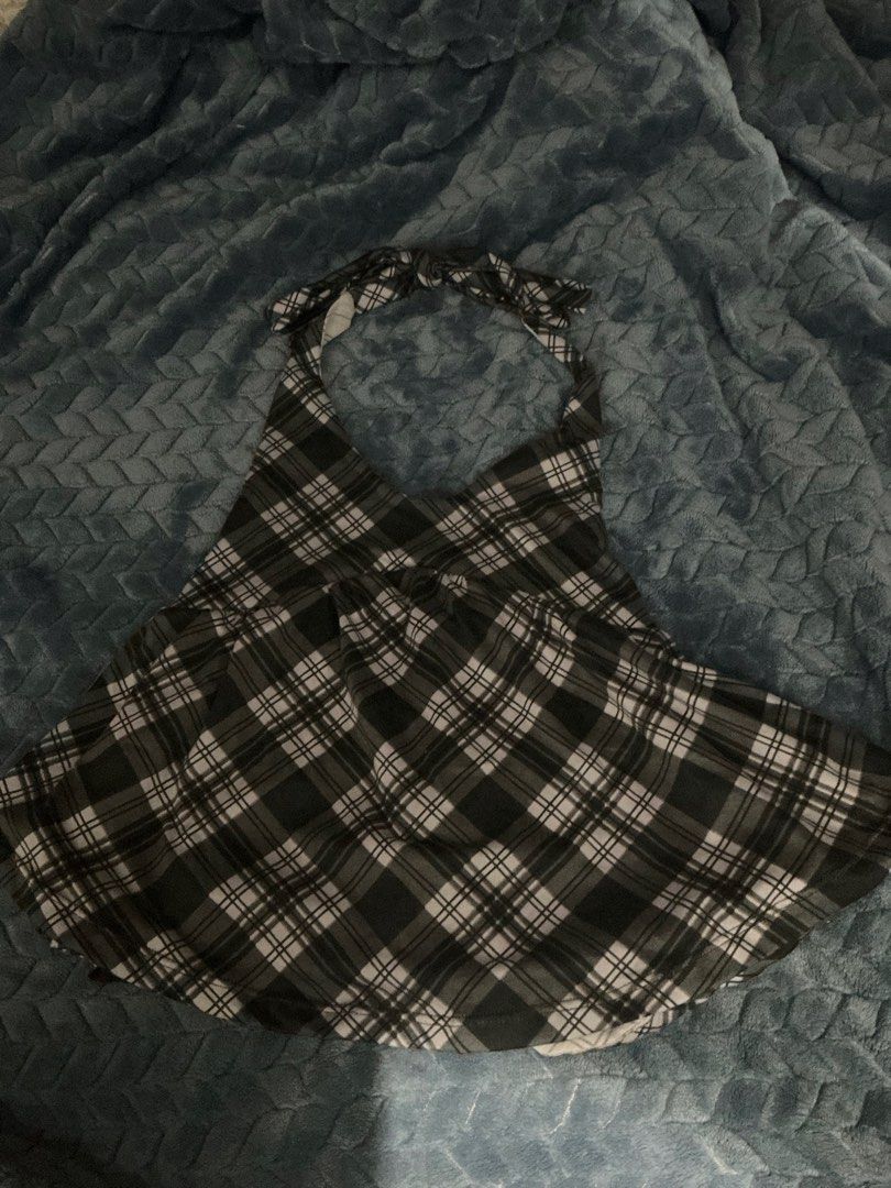 Plaid Halter Top with Tie Neck (Category: Sleeveless) located in Taytay. Submitted by eliela (Listing ID 1458388330, Image 1). Description: - Adorable plaid halter top - Adjustable neck ties for a perfect fit - Lightweight and flowy fabric - Versatile: great for casual outings or dressing up - Pairs well with jeans or shorts - A fun and stylish wardrobe addition - Never worn.