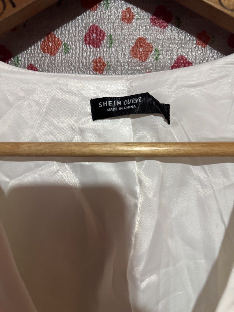 Plus size shein white coat (Category: Coats, Jackets and Outerwear) located in Bacoor. Submitted by teneleven_apparel (Listing ID 1458353483, Image 2). Description: Size: 1XL Measurement:21x28L Condition: used once J&T or Lalamove.