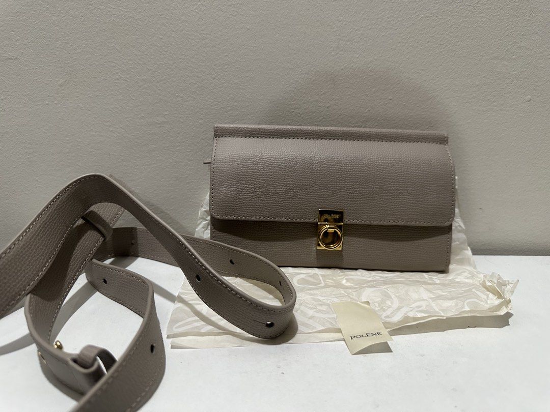 Polene Numero Sept Belt Wallet (Category: Luxury Bags & Wallets) located in Manila. Submitted by kyssmenot (Listing ID 1458441400, Image 2). Description: used once - Grey Polene bag - Made of genuine leather - Features a detachable strap - Elegant gold hardware detail on the front - Ideal for everyday wear.