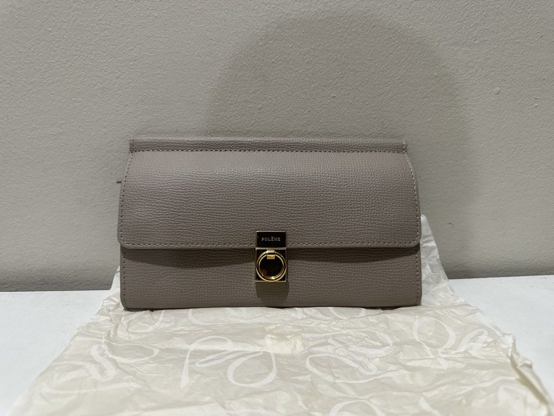 Polene Numero Sept Belt Wallet (Category: Luxury Bags & Wallets) located in Manila. Submitted by kyssmenot (Listing ID 1458441400, Image 1). Description: used once - Grey Polene bag - Made of genuine leather - Features a detachable strap - Elegant gold hardware detail on the front - Ideal for everyday wear.