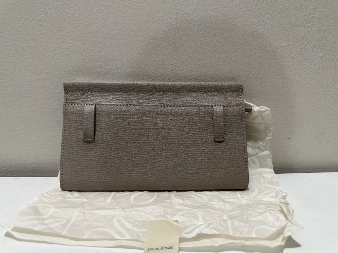 Polene Numero Sept Belt Wallet (Category: Luxury Bags & Wallets) located in Manila. Submitted by kyssmenot (Listing ID 1458441400, Image 3). Description: used once - Grey Polene bag - Made of genuine leather - Features a detachable strap - Elegant gold hardware detail on the front - Ideal for everyday wear.