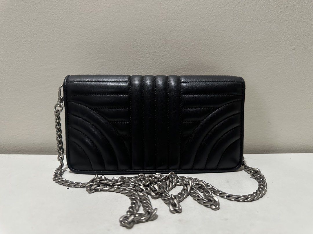Prada Black Quilted Leather Wallet on Chain (Category: Luxury Bags & Wallets) located in Manila. Submitted by kyssmenot (Listing ID 1458441155, Image 2). Description: - Authentic Prada Wallet on Chain - Color: Black - Material: Quilted Leather - Hardware: Silver - Includes: Original Box, Authenticity Cards - Perfect for carrying essentials.