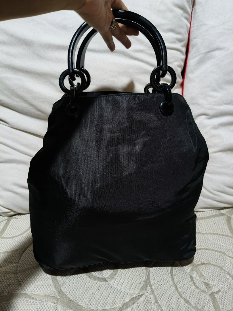 Prada Nylon Handbag (Category: Luxury Bags & Wallets) located in Quezon City. Submitted by online_sari_sari (Listing ID 1458442080, Image 2). Description: 💯 authentic missing zipper puller negotiable.
