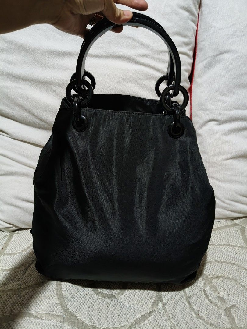 Prada Nylon Handbag (Category: Luxury Bags & Wallets) located in Quezon City. Submitted by online_sari_sari (Listing ID 1458442080, Image 1). Description: 💯 authentic missing zipper puller negotiable.