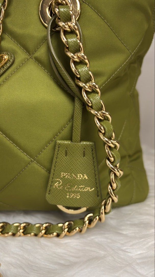 Prada Re-Edition 1995 Nylon Quilted Chain Shoulder Bag (Category: Luxury Bags & Wallets) located in Mandaluyong City. Submitted by luxeprive_byadi (Listing ID 1458429150, Image 2). Description: FOR SALE: PRADA RE-EDITION 1995 RE-NYLON EDERA SHOULDER BAG 💚 A rare Prada find in the gorgeous Edera green - timeless, chic, and effortlessly stylish. Selling Price: P110,000 Condition: Very Good Details: • Nylon & Saffiano leather • Gold-tone hardware •