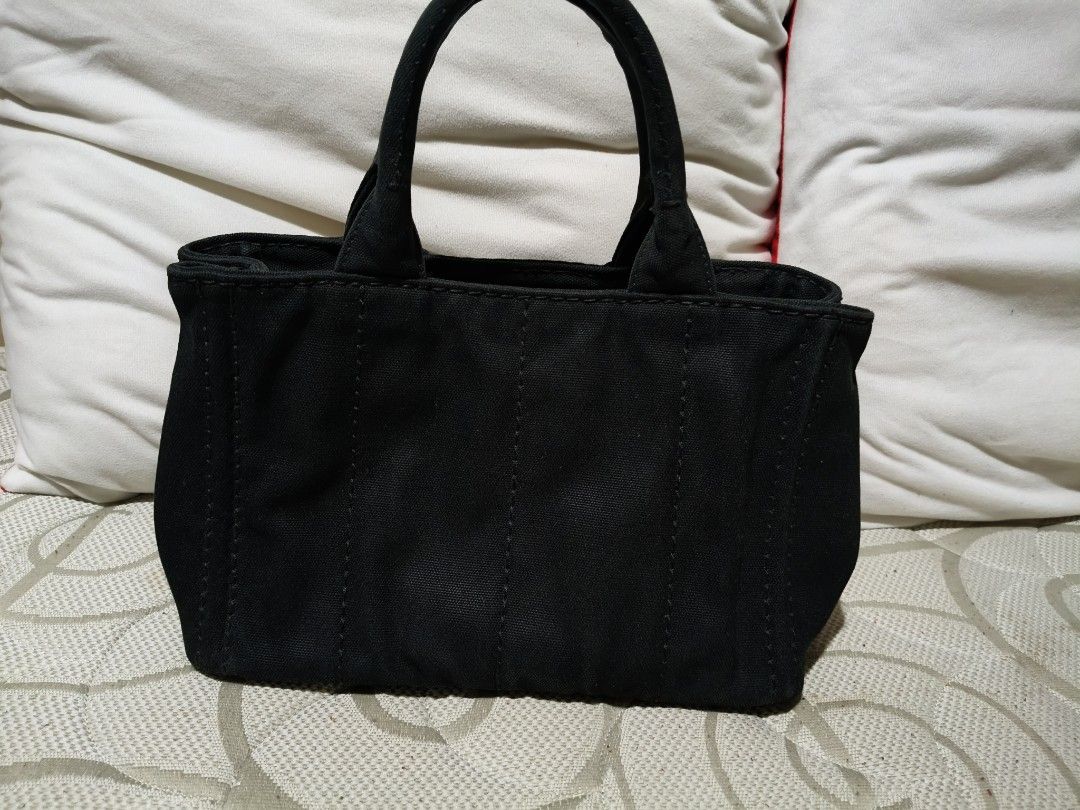 Prada Small Black Canapa (Category: Luxury Bags & Wallets) located in Quezon City. Submitted by online_sari_sari (Listing ID 1458440113, Image 2). Description: 💯 authentic slightly negotiable.