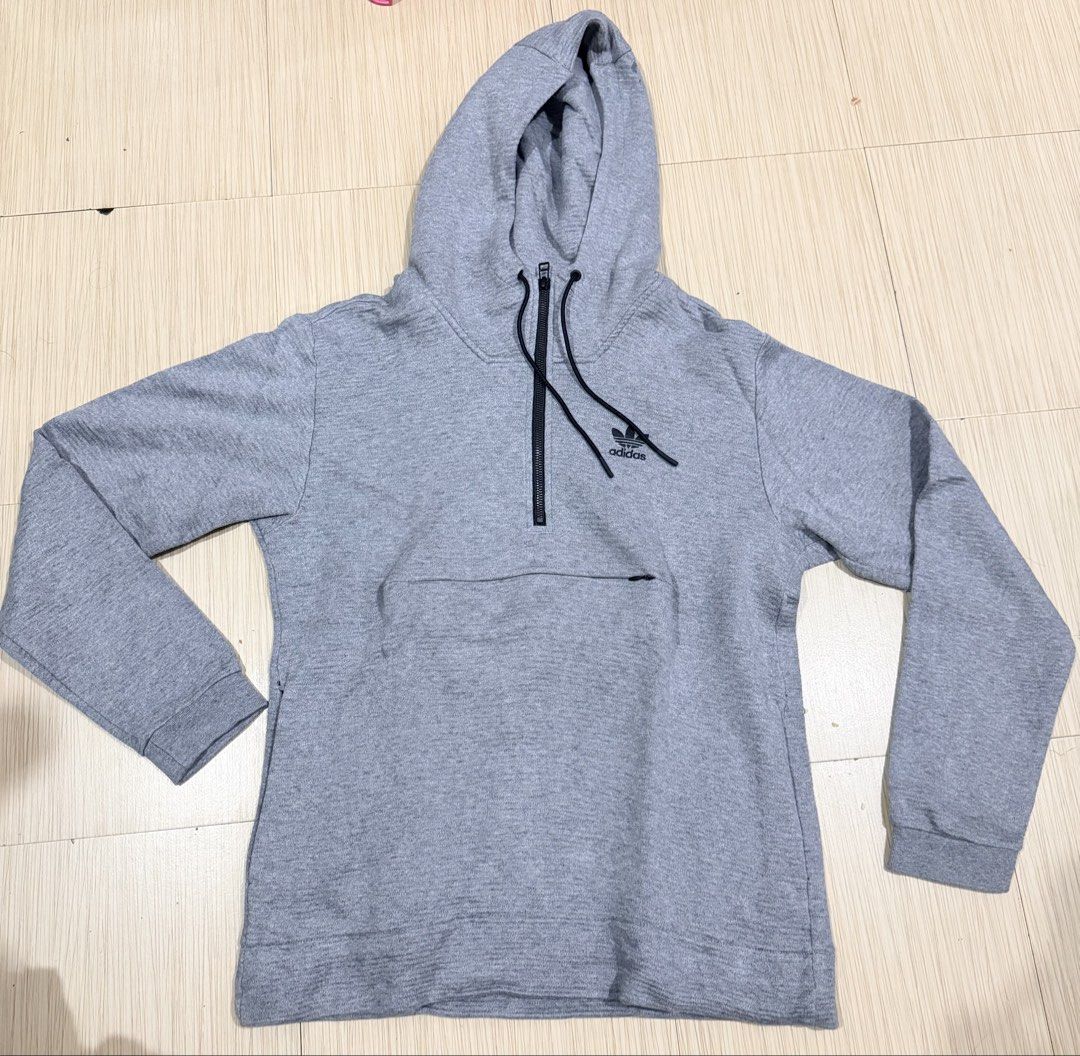 Pre-loved Adidas Grey Hoodie Pullover Quarter Zip size small (Category: Coats, Jackets and Outerwear) located in Quezon City. Submitted by muradito_01 (Listing ID 1458374102, Image 1). Description: - Grey Adidas hoodie - Quarter zip with drawstring hood - Front kangaroo pocket - Ribbed cuffs and hem - Size: UK US S/P, J CON S/P, F S, D S - Made in China - Ideal for casual wear.