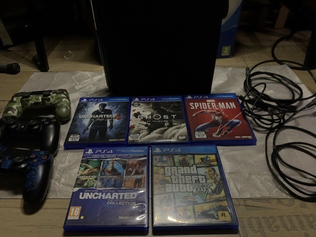 PS4 Slim 1TB Complete Set + 3 Controllers + 5 Games + Original Box (Category: PlayStation) located in Manila. Submitted by cdewb (Listing ID 1458445340, Image 1). Description: PS4 Slim 1TB Complete Set + 3 Controllers + 6 Games + Original Box Selling my PS4 Slim 1TB in good condition. Fully working and comes with the original box and complete cables. 🎮 INCLUDED: • PS4 Slim 1TB • 3 Controllers • Original PS4 box • Complete cables (Power + HDMI) •