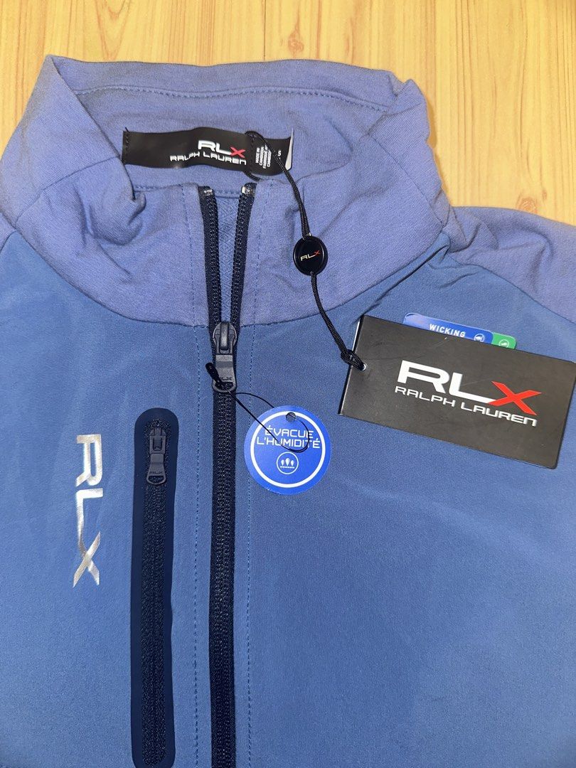 Ralph Lauren Vest (Category: Vests) located in Quezon City. Submitted by mancave_stuff (Listing ID 1458354126, Image 2). Description: RLX Ralph Lauren full zip vest Blue color Size Small: W19” x L26” Versatile use for high performance athletic & outdoor activities. Golf, Hiking, Running, Tennis, Pickleball, Gym RFS: Wrong size.