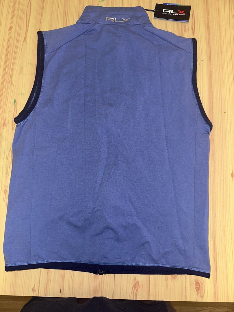 Ralph Lauren Vest (Category: Vests) located in Quezon City. Submitted by mancave_stuff (Listing ID 1458354126, Image 3). Description: RLX Ralph Lauren full zip vest Blue color Size Small: W19” x L26” Versatile use for high performance athletic & outdoor activities. Golf, Hiking, Running, Tennis, Pickleball, Gym RFS: Wrong size.