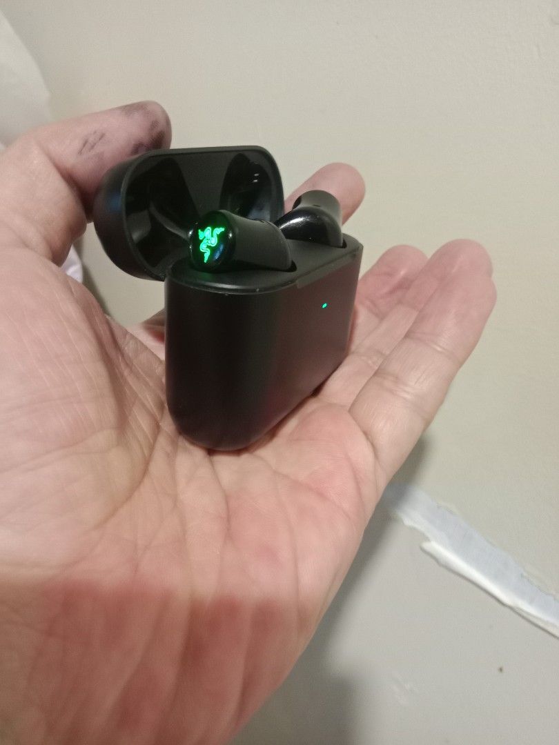 Razer Wireless Earbuds with Charging Case (Category: Earphones) located in Makati City. Submitted by speedy1990 (Listing ID 1458308932, Image 2). Description: - Authentic Razer wireless earbuds in sleek black. - Iconic green glowing Razer logo on each earbud. - Includes compact charging case with indicator light. - Perfect for immersive gaming sessions. - Ideal for everyday listening and calls..